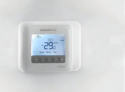 a honeywell thermostat on the wall