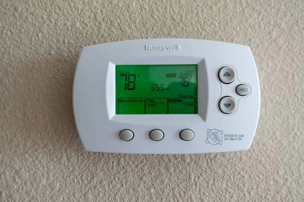 a honeywell thermostat on the wall 